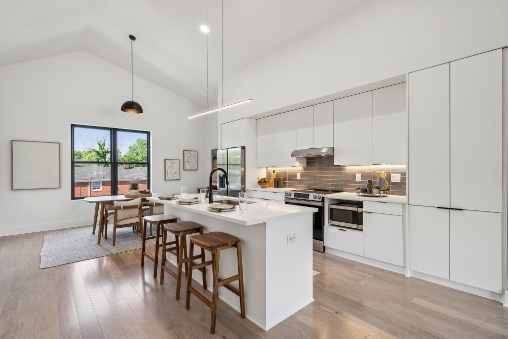 Chestnut Flats, Richmond: a vaulted open kitchen with pendant lighting